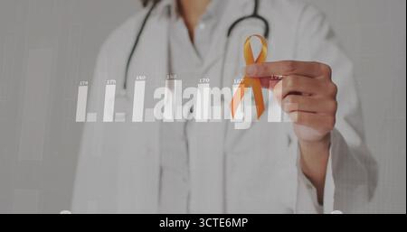 Displaying Hispanic doctor holding orange ribbon in clinic, with stethoscope and bar chart overlay Stock Photo