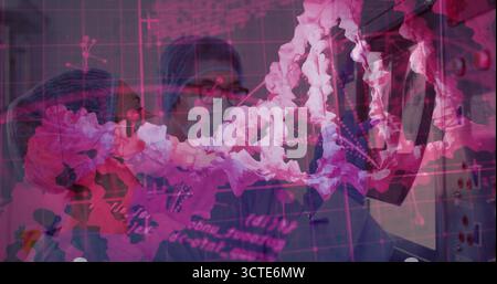 Scientists in lab coats and hairnets examining digital DNA double helix in lab, with PC monitors Stock Photo