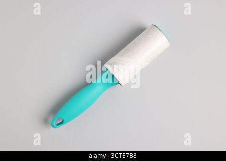 One lint roller on light grey background, top view Stock Photo