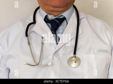 A close up of a doctor with a stethoscope around his neck Stock Photo