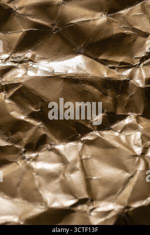 Crumpled brown paper as background. Close up Stock Photo