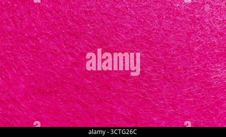 Fine Detailed Close-Up of pink Non-Woven Felt Fabric Textile Texture for Background and Design Stock Photo