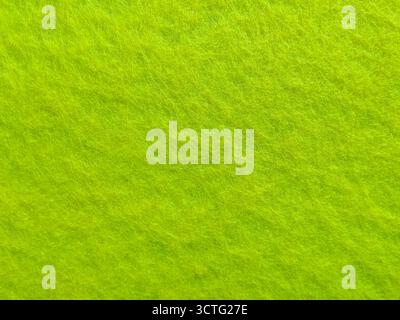 Fine Detailed Close-Up of green Non-Woven Felt Fabric Textile Texture for Background and Design Stock Photo