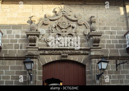 the facade sculptural relief of Casa Manila, a museum located in Intramuros, Manila, Philippines. Stock Photo