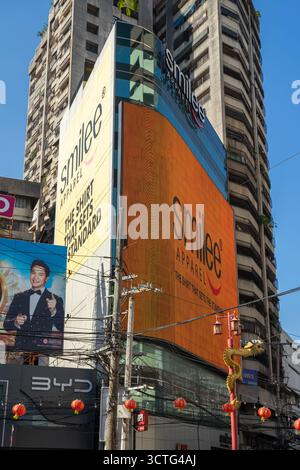 Smilee apparel local made shirts billboard advertising in Chinatown Manila, Philippines Stock Photo