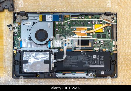 internal components of an ASUS laptop, model from the X415DA, Stock Photo
