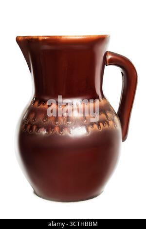 Vintage brown ceramic jug isolated on white background Stock Photo