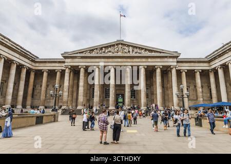 Grand Neoclassical Facade of The British Museum with Visitors. London, UK, 27 June 2023 Stock Photo