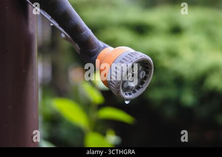 Close up on a holder of garden hose Stock Photo