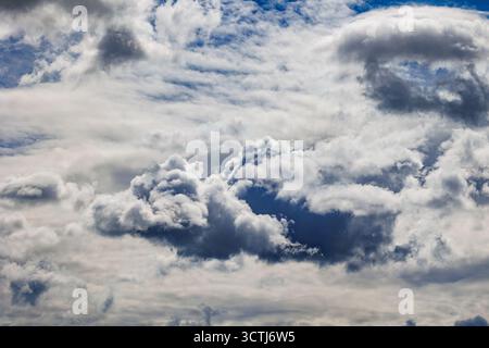 White clouds on a blue sky during summer, Poland Stock Photo