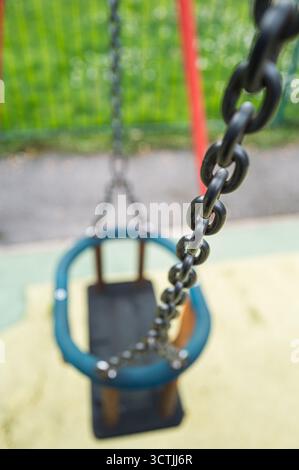 chain supporting, child's cradle seat swing Stock Photo