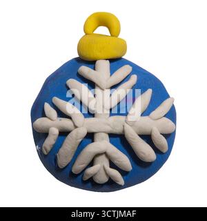 Christmas bauble with snowflake sculpted from children’s play clay isolated on white background with clipping path Stock Photo