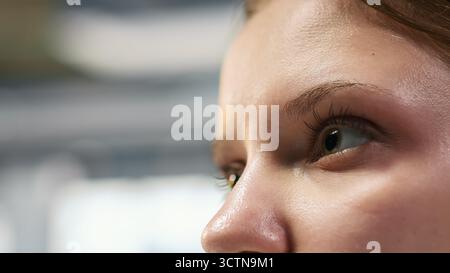 Extreme close up of female engineer using AI LLM chatbot, optimizing company systems performance. System administrator uses artificial intelligence to convert manual workflows into automated scripts Stock Photo