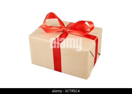 brown paper christmas gift box with red ribbon bow isolated on white Stock Photo