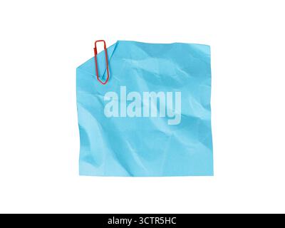 blue crumpled sticky note paper with red paperclip isolated on white Stock Photo