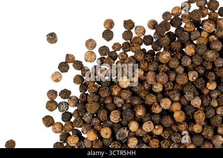 corner of black pepper corns isolated on white Stock Photo