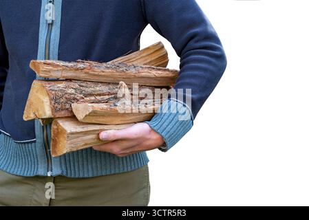 Man carrying firewood logs in autumn isolated on white background Stock Photo