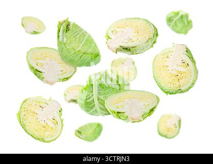 Fresh Savoy cabbage flying in air against white background Stock Photo