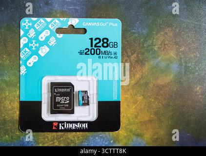 Kingston Canvas Go Plus 128GB fast micro SD card isolated on abstract background Stock Photo