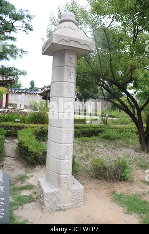 A photograph of a stone water level gauge from 1441, a South Korean ...