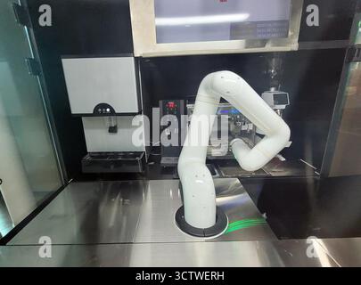 A photograph of an automated robot for making coffee at a service station near Gyeongju, South Korea. The rise of robotic baristas like this is part of a broader trend of automation in the service industry, particularly in modernised countries like South Korea, aiming to improve efficiency and offer contactless services. 2025. Stock Photo