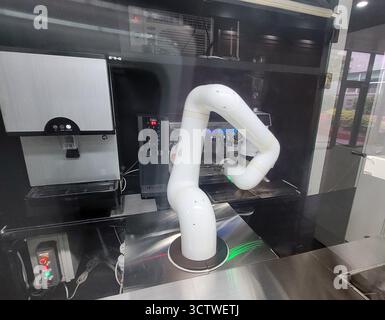 A photograph of an automated robot for making coffee at a service station near Gyeongju, South Korea. The rise of robotic baristas like this is part of a broader trend of automation in the service industry, particularly in modernised countries like South Korea, aiming to improve efficiency and offer contactless services. 2025. Stock Photo