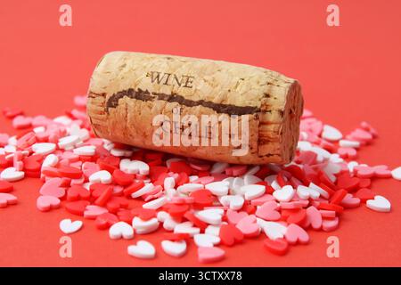 Love for Chilean wine, a wine bottle cork on many hearts Stock Photo