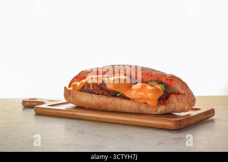 Italian Hoagie Roll, Crusted Chicken Parm Fillet, Cheese, Lettuce, Pesto Sauce Blend Sandwich Stock Photo
