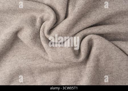 Soft grey merino wool sweater texture as a background. Top view. Stock Photo