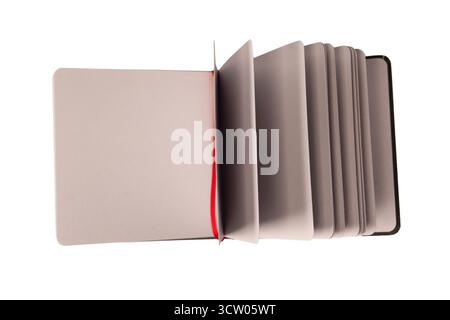 Open notebook with blank pages isolated on a white background. Top view. Stock Photo