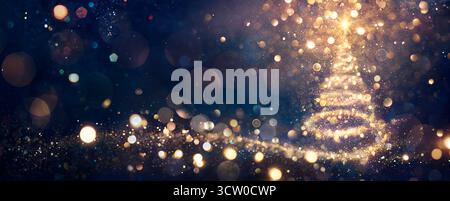 Christmas Tree In Shiny Night - Golden Glittering In Abstract Blue Background Stock Photo