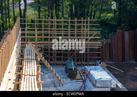 Wooden formwork for upcoming concrete pouring, preparing structural foundations in Finland, Espoo, precision, engineering, urban development Stock Photo