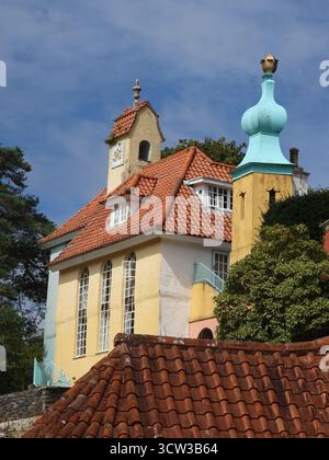 View of The Chantry, built on a high escarpment of rock in 1937, one of the many brightly coloured buildings in the fantasy village of Portmeirion. Stock Photo