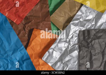 Colored crumpled paper as background. Toned image Stock Photo