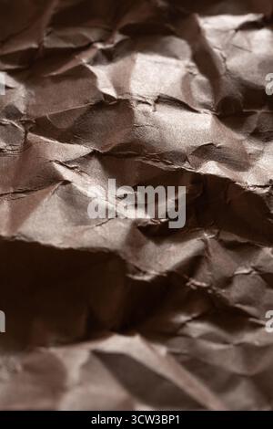 Crumpled brown paper background. Close up Stock Photo