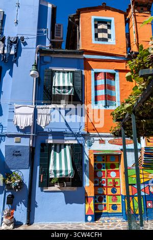 Burano Italy - September 4 2025: Colorful Homes Casa Bepi and Casa Angela in Burano Italy Stock Photo