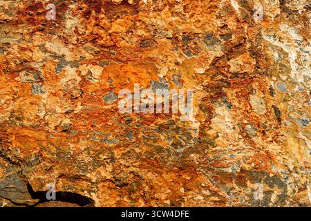 Real natural grunge rusted raw marble stone surface texture as extracted from the mountain. Stock Photo