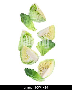 Fresh Savoy cabbage flying in air against white background Stock Photo