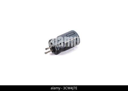 Electrolytic capacitor isolated on white background. Electronic parts concept Stock Photo
