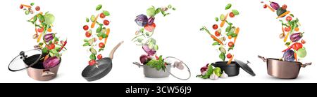 Set of kitchenware and different flying vegetables on white background Stock Photo
