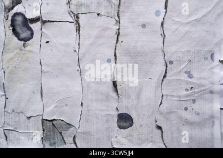 Collage of torn paper with ink blot stain Stock Photo