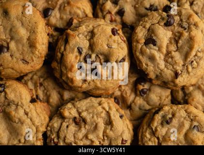 Close up of freshly baked chocolate chop cookies filling frame. Stock Photo
