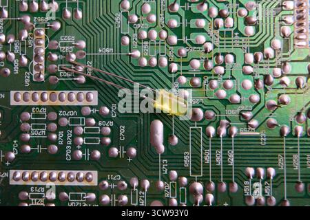 Isolated single yellow Light Emitting Diode (LED) on the gray Stock ...