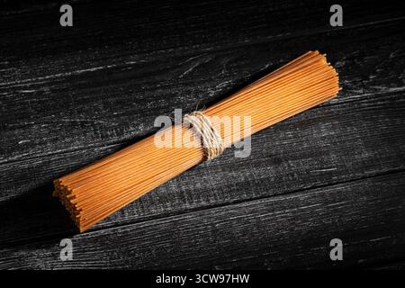 brown integrale on black wood background Stock Photo
