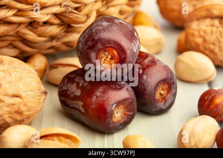 dates fruit on wood background Stock Photo