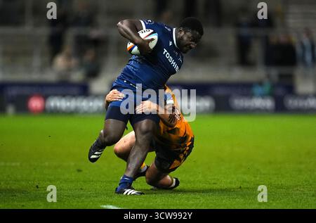 Ollie Fletcher of Newcastle Red Bulls gets set to charge down a kick ...