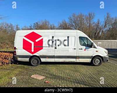 Amsterdam, the Netherlands - Februari 1, 2025: DPD delivery van parked on a public parking lot. Nobody in the vehicle. Stock Photo