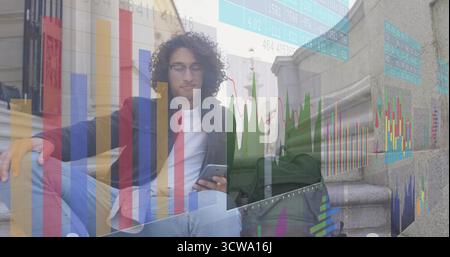 Scrolling curly-haired student on stone stairs, with smartphone, laptop, backpack and chart overlay Stock Photo