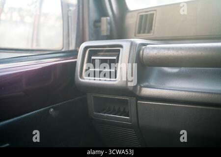 Close up of air vent hole on the side dashboard car Stock Photo