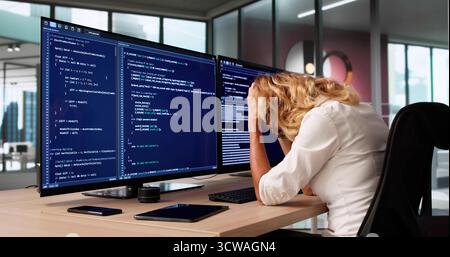 Bored Female Software Developer Web Programmer In Business Coding. Stock Photo